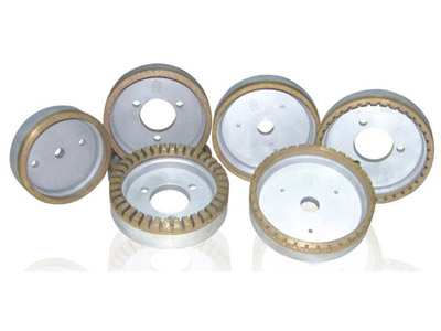 Metal bond wheels for glass machinery