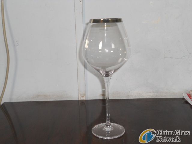 Wine glass with silver rim