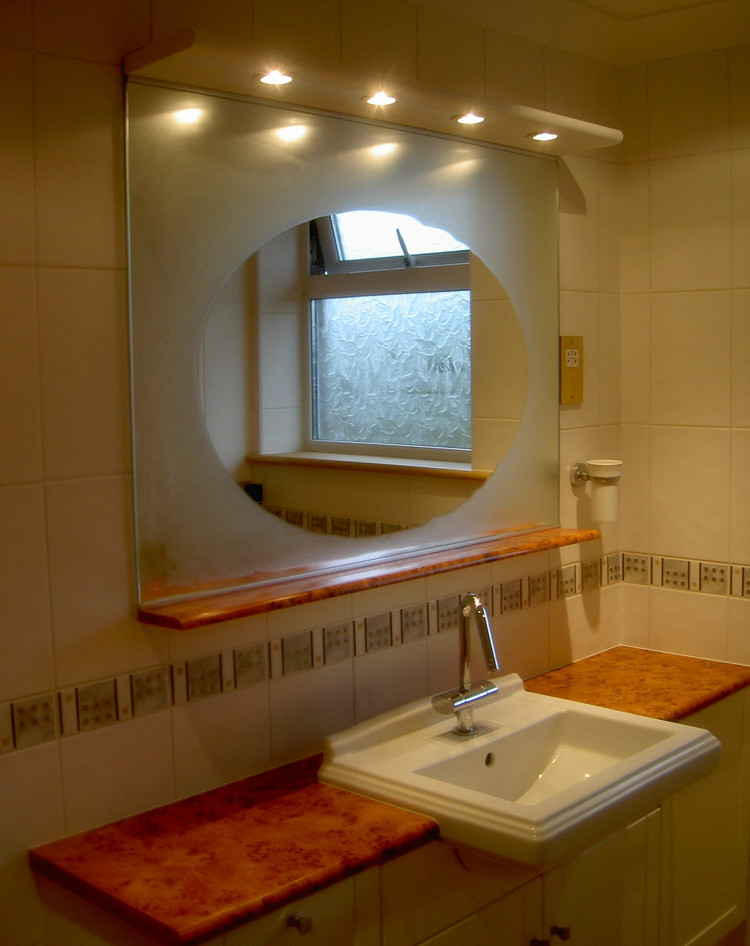 LED illuminated bathroom mirrors