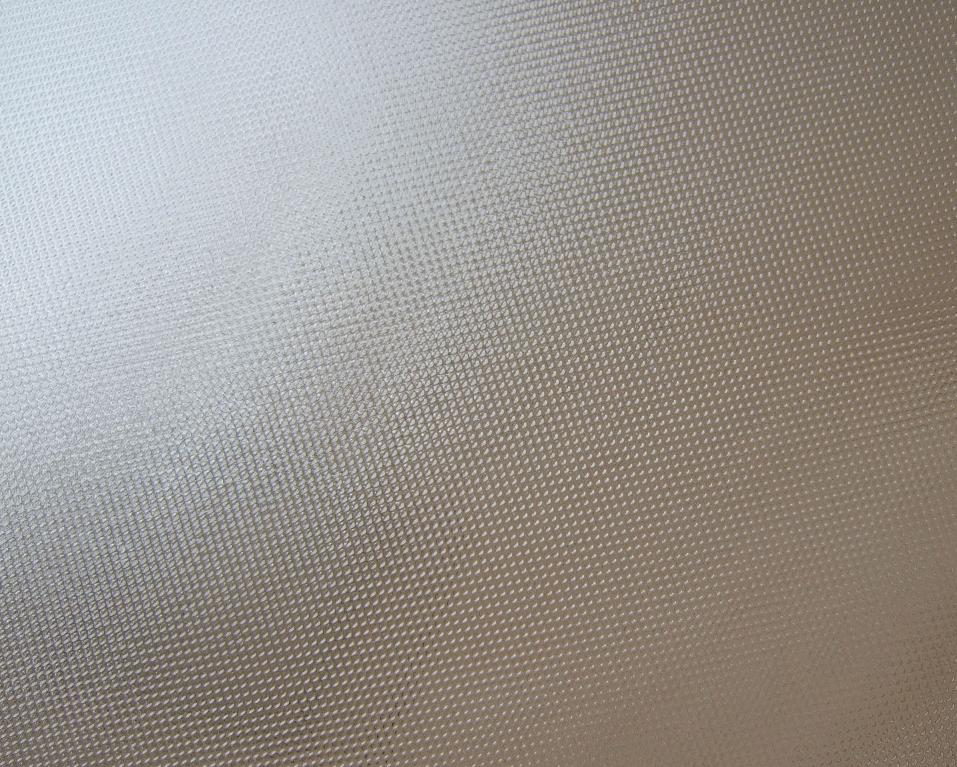 Low-iron patterned tempered solar glass