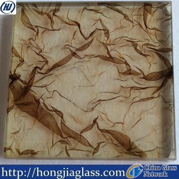 Fabric laminated glass