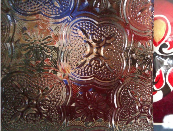 bronze patterned glass flora