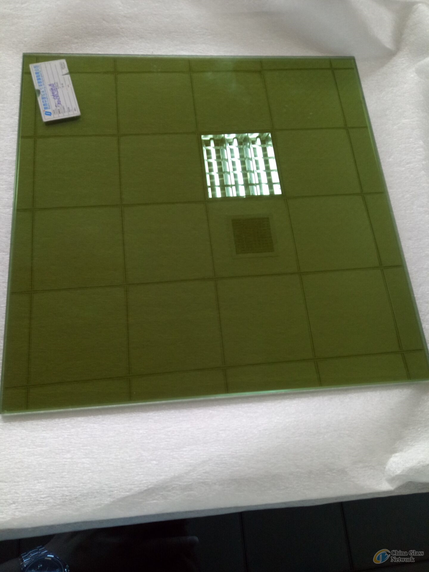 Dark green reflective glass