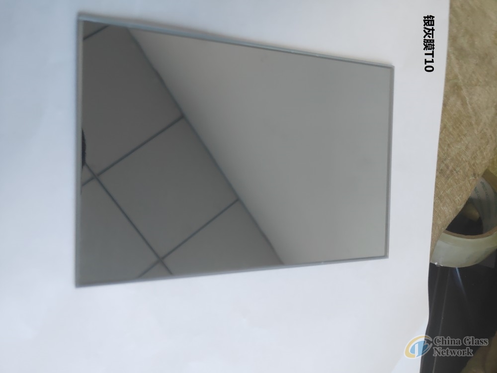 Temperable heat reflective coated glass