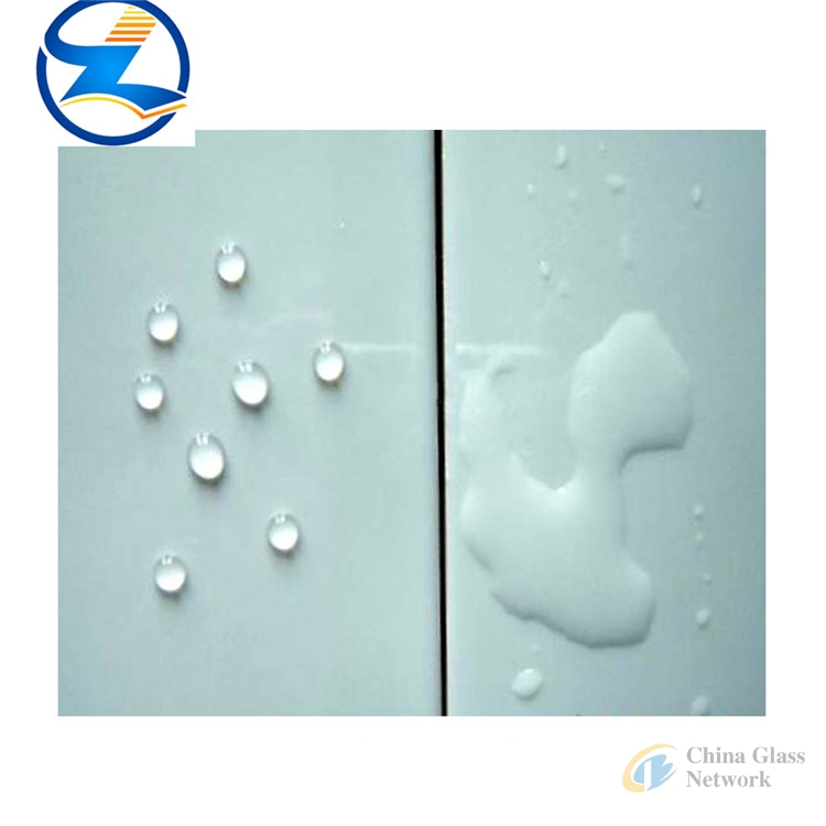 Self-cleaning glass panel for shower door